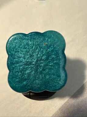 Blue-green or Teal Scalloped Square-Shaped  “Pop Socket-like” Phone Grip